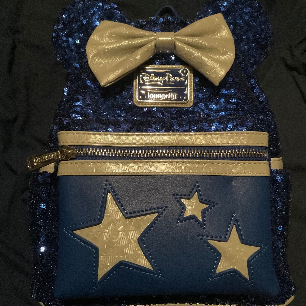 Disney blue make a wish star loungefly
